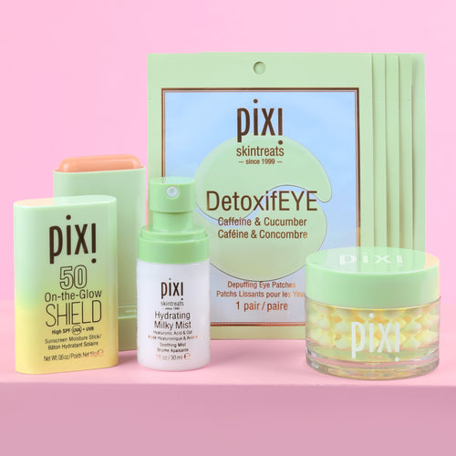 Petra's Travel Glow bundle includes Hydrating Milky Mist, DetoxifEYE Depuffing Eye Patches 5 pair, On-the-Glow SHIELD SPF 50, Vitamin-C CremeSerum on pink background. view 1