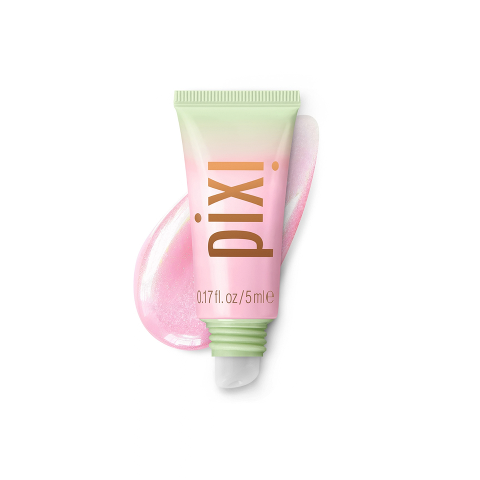Pixi Petite LipTone tube in a pink and light green gradient, featuring the brand name 'pixi' in gold lettering, with a pink iridescent gel smear behind it on a white background. view 1