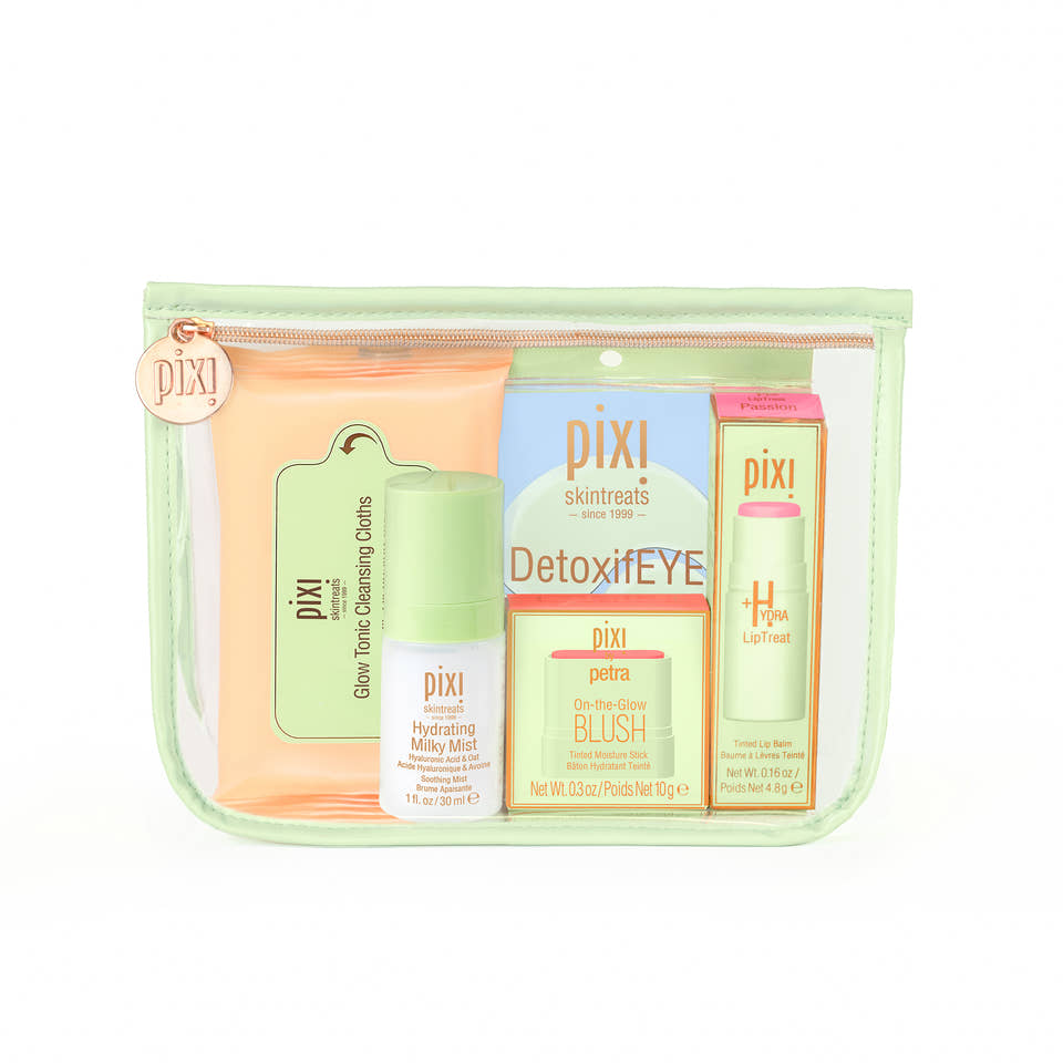  PIXI skincare product set with various items in a clear pouch on a white background view 2