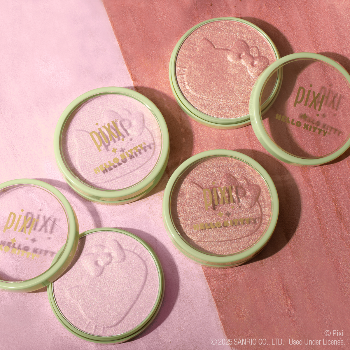Pixi + Hello Kitty Hello Glow-y Powder shown on multi-colored background with multiple open containers of product