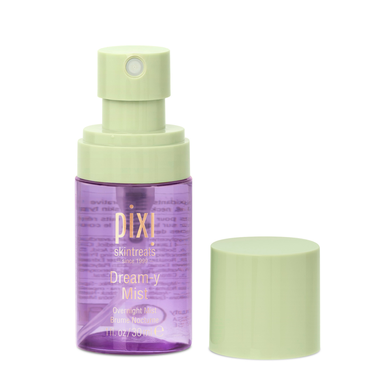 Pixi Skintreats Dreamy Mist overnight mist in a purple bottle with a light green pump and cap, shown on a white background.